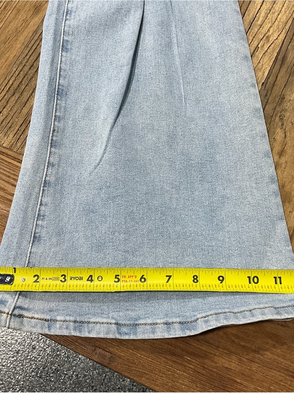 Light Blue High-Rise Flare Jeans with Knee Bow Carpenter Detail - Picture 9 of 11